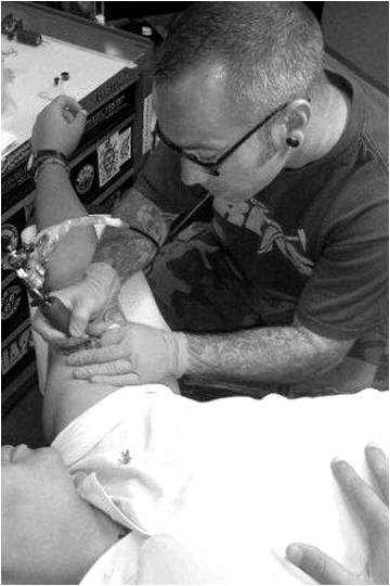 Troy Garris, tattoo artist at Custom Tattoo, Milwaukee, Wisconsin.